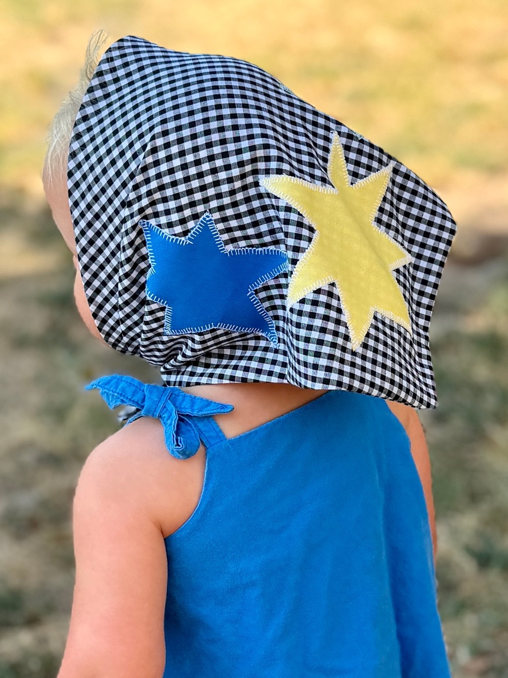 Handmade Black Gingham Kids Headscarf with Blue Yellow and Green Star Appliqués